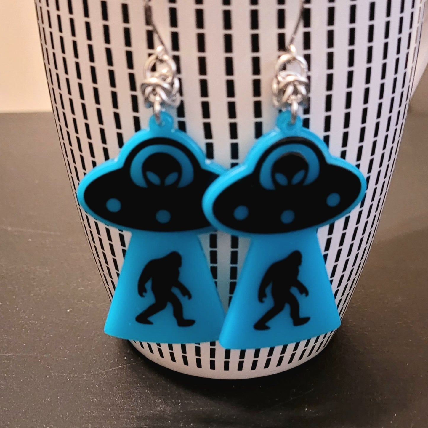 UV Bigfoot Alien Earrings
