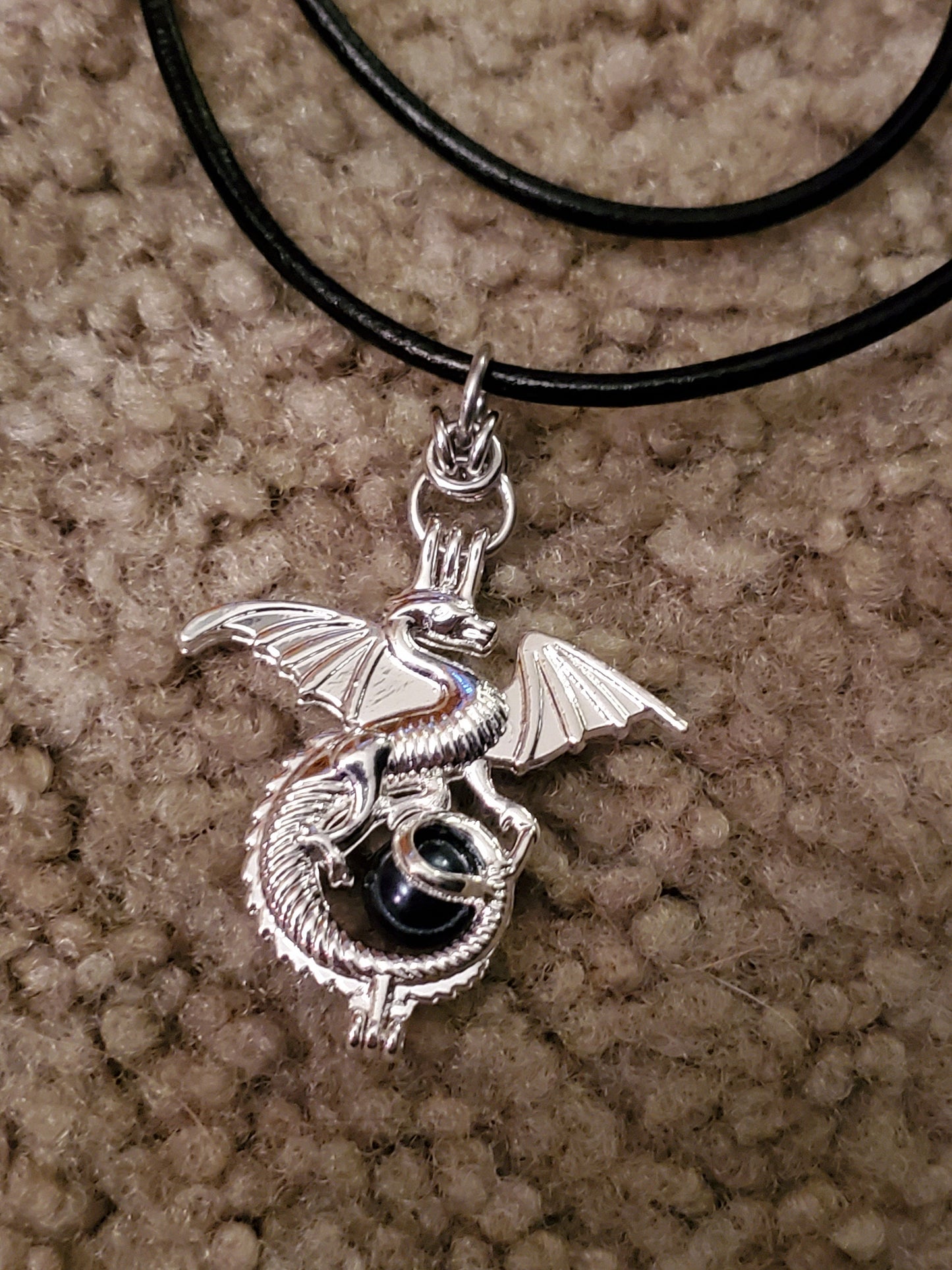 Dragon Capture Pendant with Leather Cord