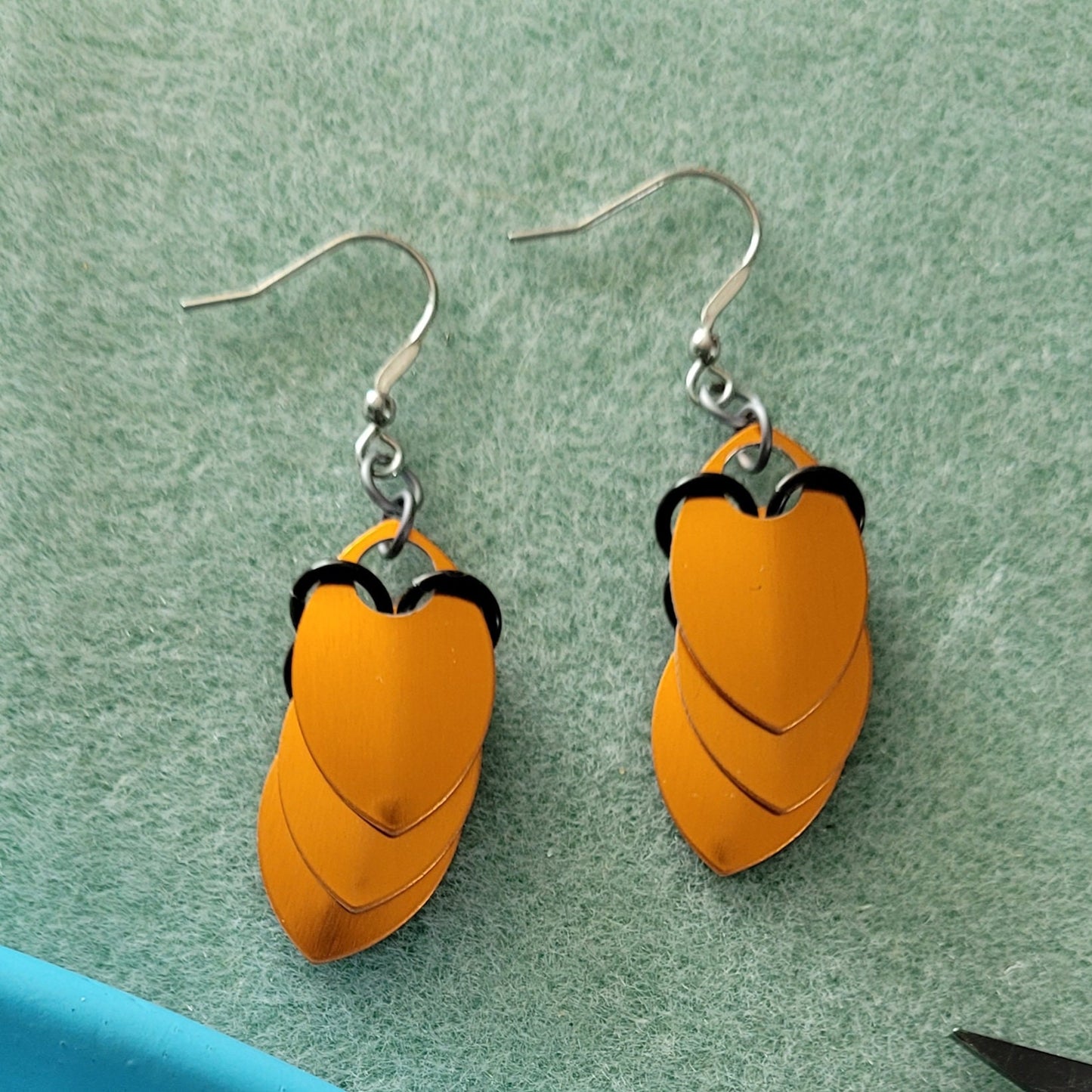 Spooky Linear Dragon Scale Black and Orange Dangle Earrings