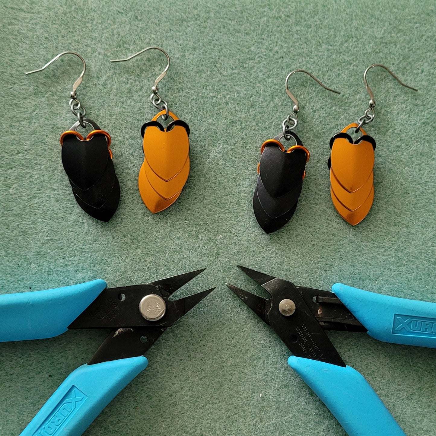 Spooky Linear Dragon Scale Black and Orange Dangle Earrings