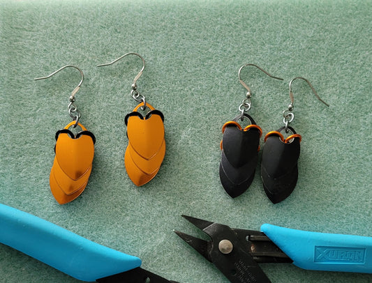 Spooky Linear Dragon Scale Black and Orange Dangle Earrings